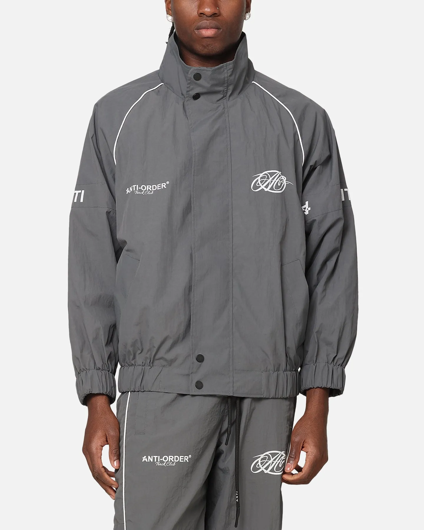 The Anti Order Track Club Windbreaker Jacket Dark Grey/Grey