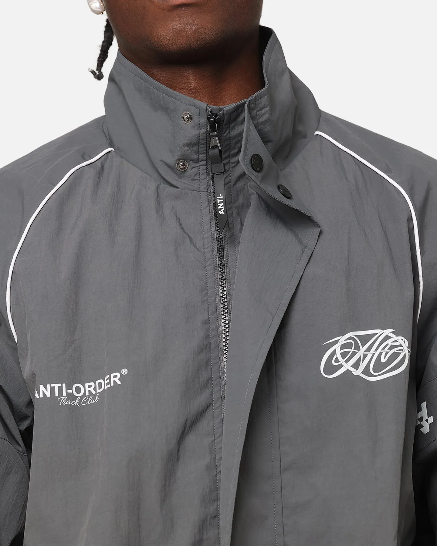 The Anti Order Track Club Windbreaker Jacket Dark Grey/Grey